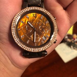 Watch with beautiful small diamonds.